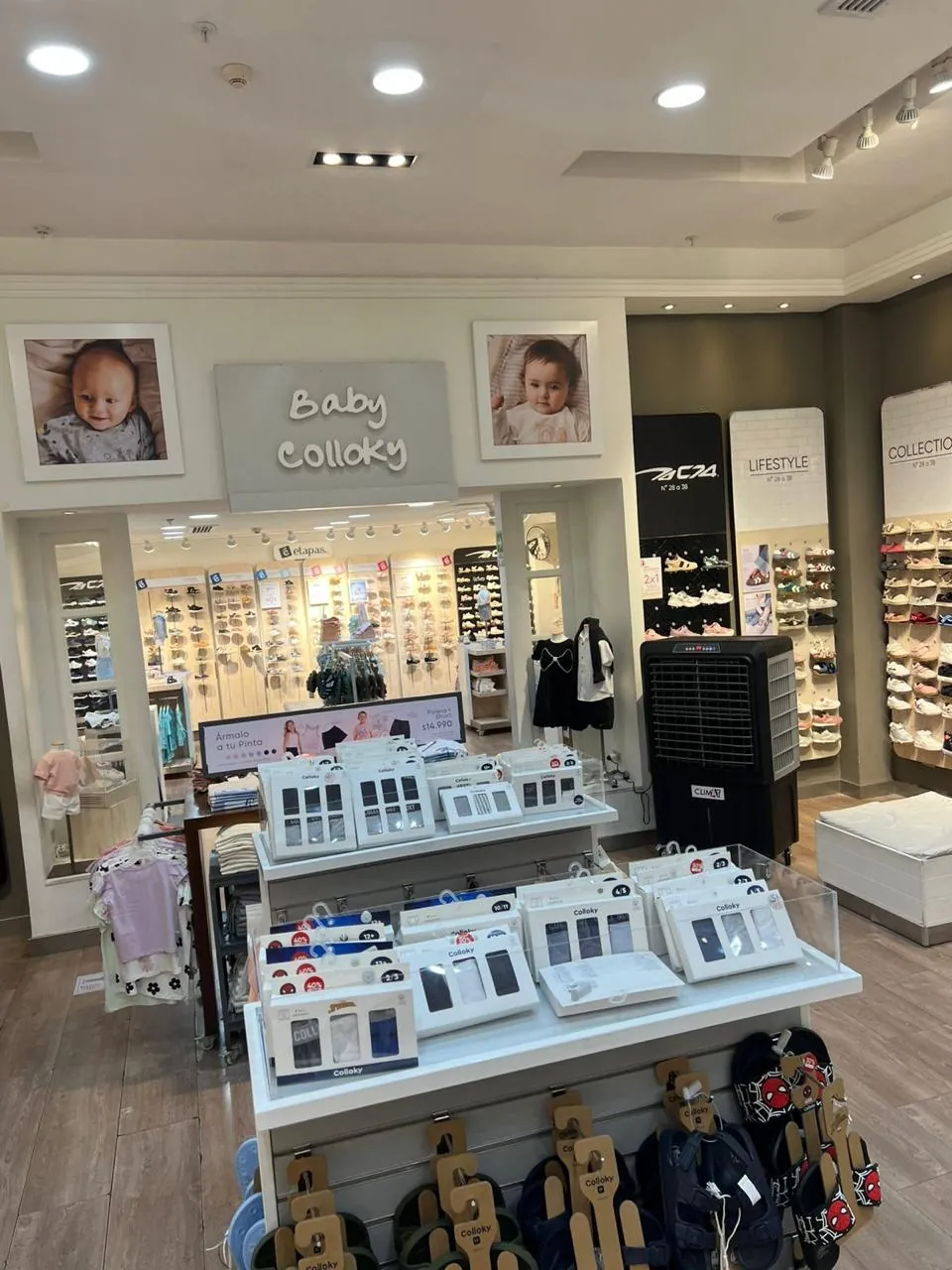 Enfriador evaporativo CLIMAT instalado en una tienda de vestuario infantil